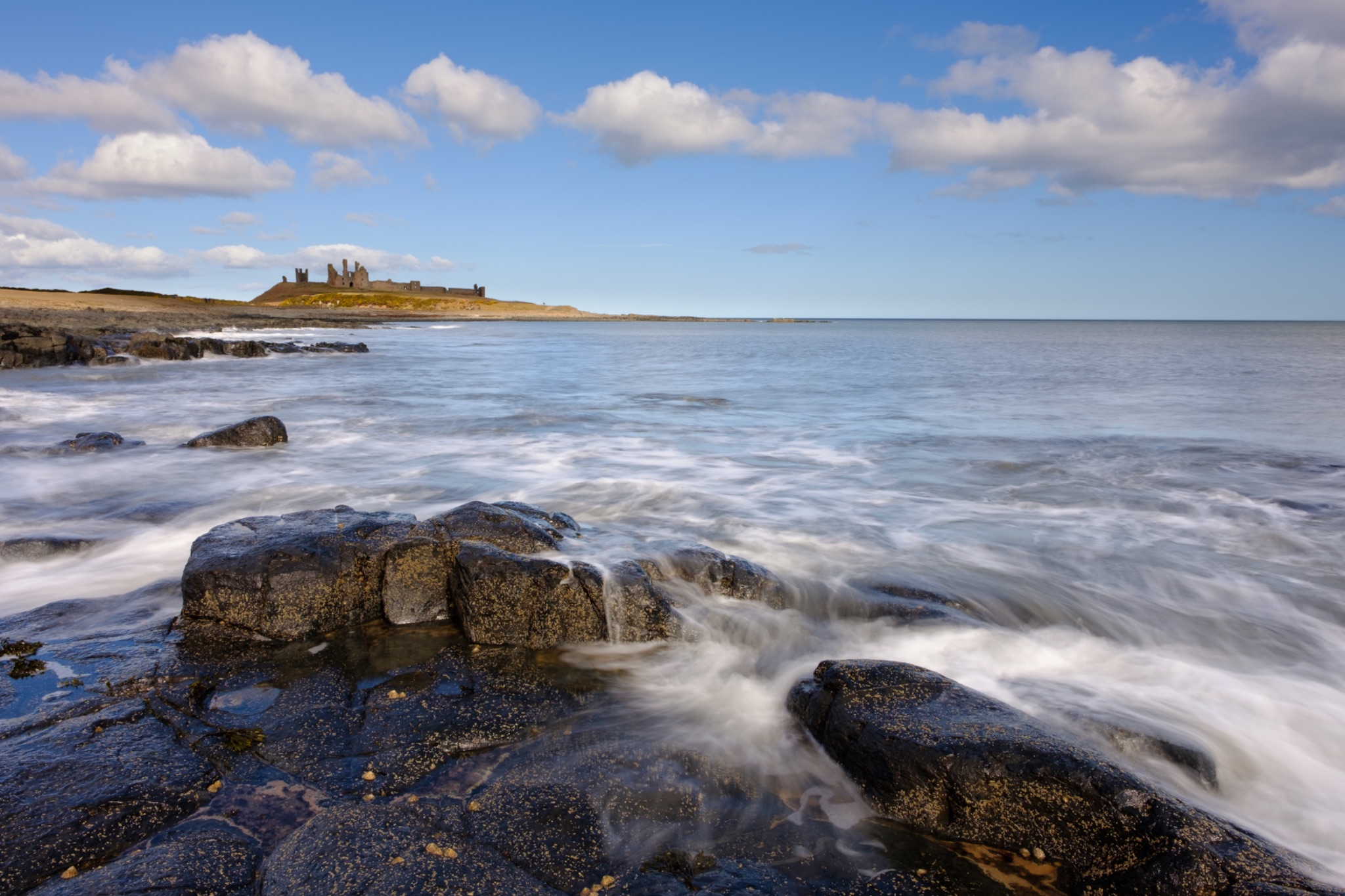England, Northumberland, Dunstanburgh Castle.
